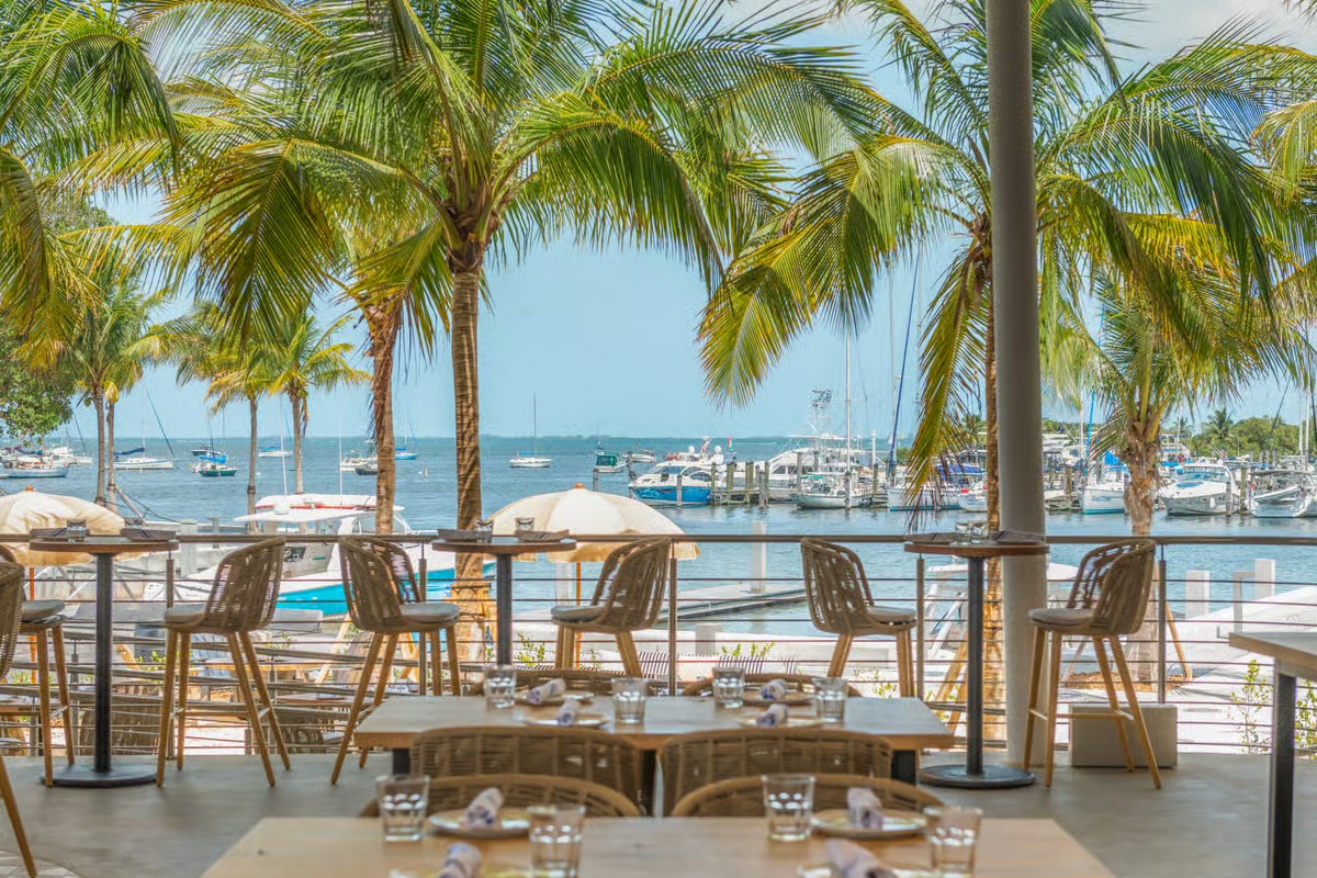 Open-air Miami restaurant overlooking a marina
